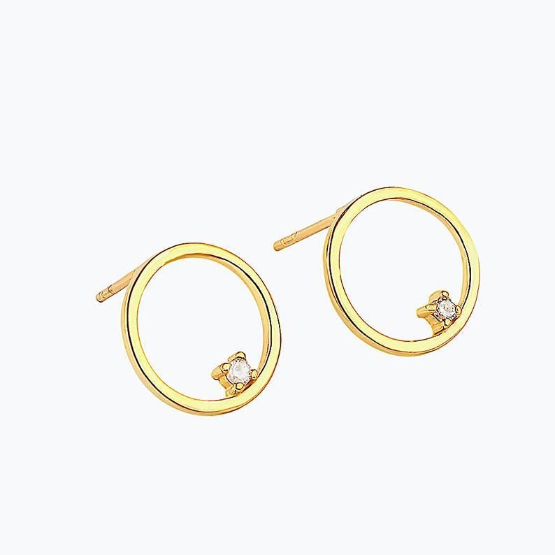 Handmade item
Length: 15 Millimeters; Width: 15 Millimeters
Materials: Gold
Gemstone: Diamond
Closure: Push back
Style: Minimalist

This Lovely Pair of Earrings are Done in a solid Gold, Tiny Hoop with a beautiful Diamond Adorned Hoop Fashion.