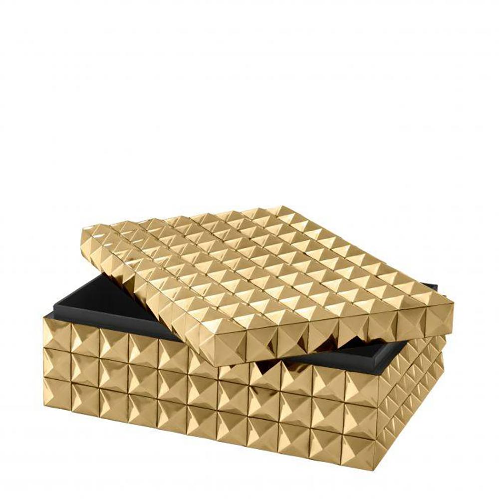 A studded decorative brass box featuring a golden finish and black inside lining. 

Measurements:
4” H x 11” W x 8” D.