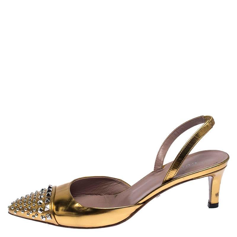 These feminine-looking flats from the house of Gucci are crafted from gold patent leather. They feature studded pointed toes, slingbacks and kitten heels. Wear them on days when you don't want to wear stilettos.

Includes: Original Dustbag

