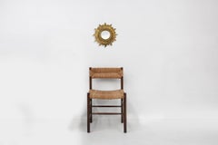 Gold sunburst mirror in resin with convex mirror, France ca. 1960