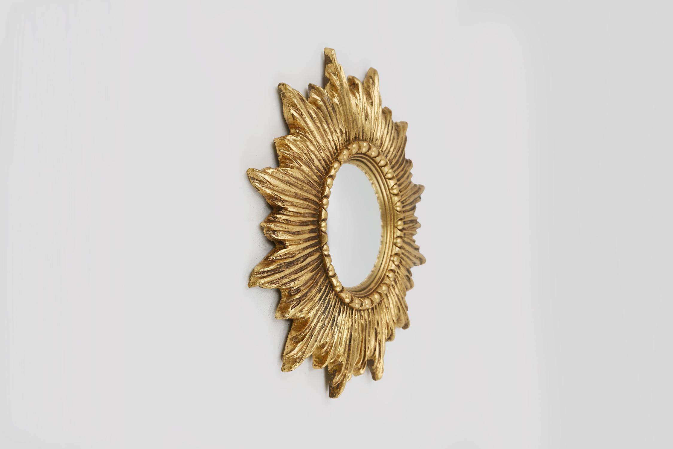 Mid-Century Modern Gold sunburst mirror in resin with convex mirror, France ca. 1960 For Sale