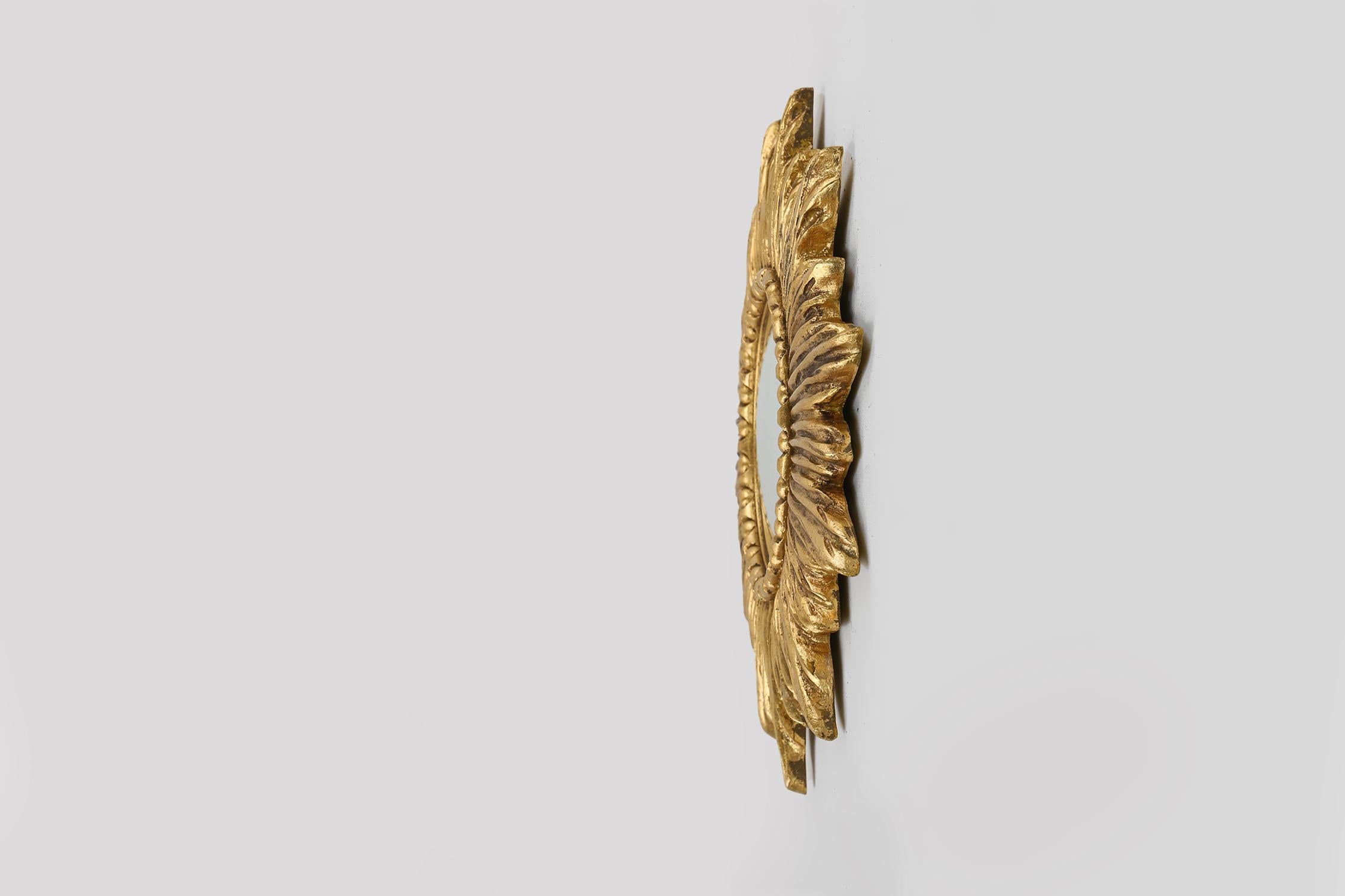 Gold sunburst mirror in resin with convex mirror, France ca. 1960 For Sale 1