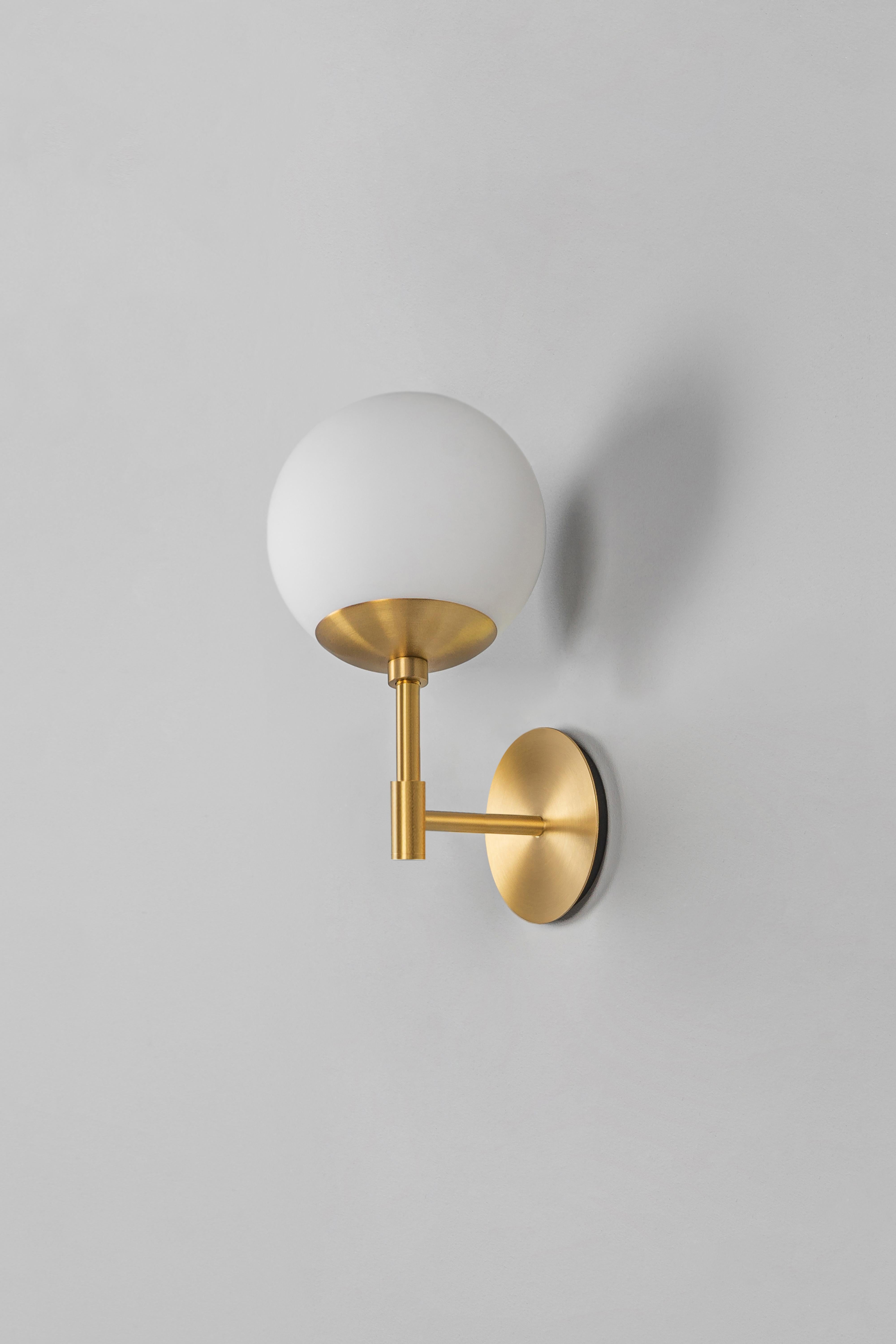Gold sunset wall sconce by Schwung
Dimensions: W 15 x D 16.1 x H 31 cm
Materials: Brass, frosted glass.
All our lamps can be wired according to each country. If sold to the USA it will be wired for the USA for instance.

 Schwung is a german