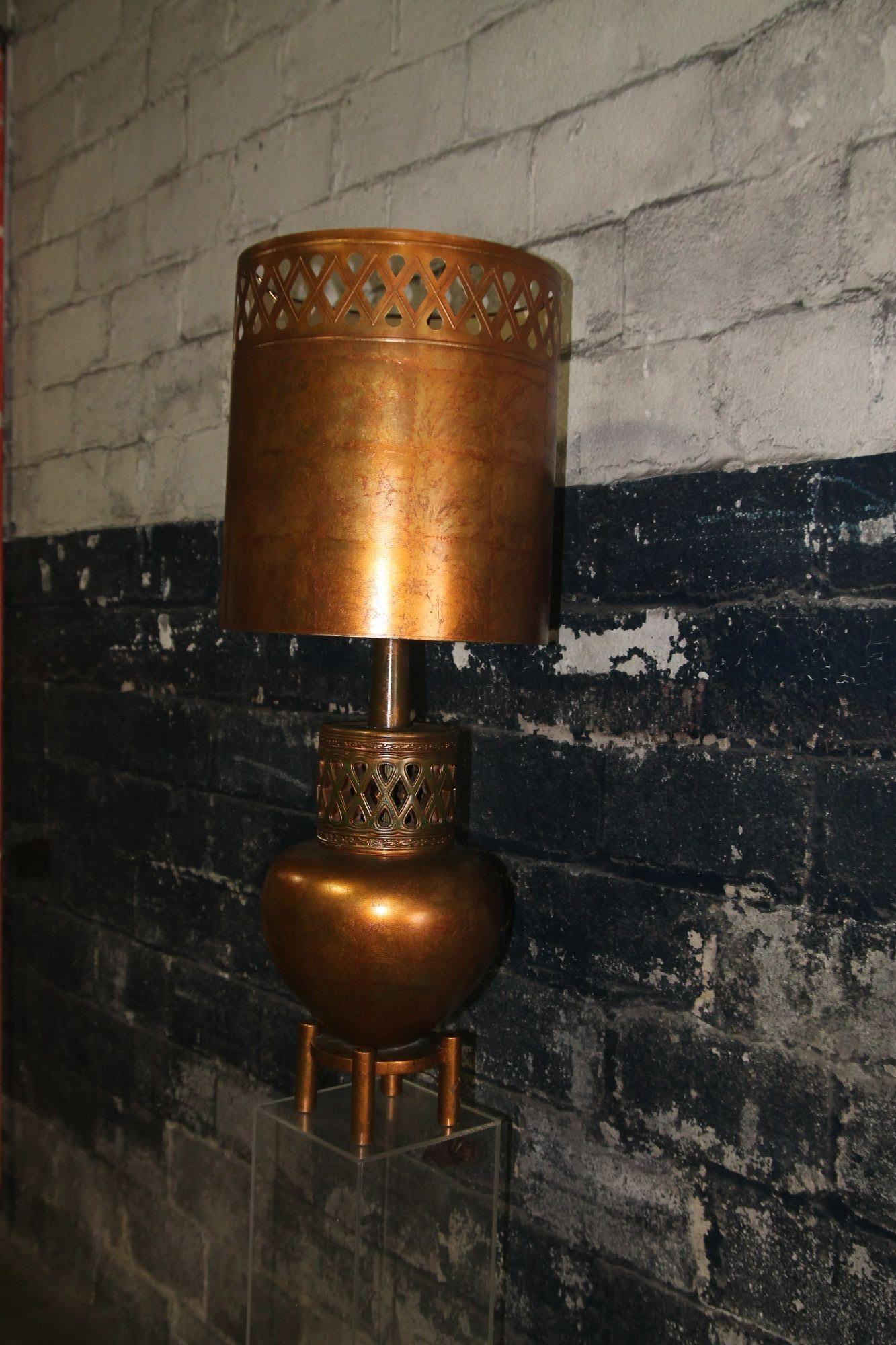 Great oversized gold with a slight splash of green, table lamp and original shade. This lamp is attributed to James Mont but it is unsigned. Its in wonderful vintage shape. This single lamp works in any decor. Check the photos to show all the great