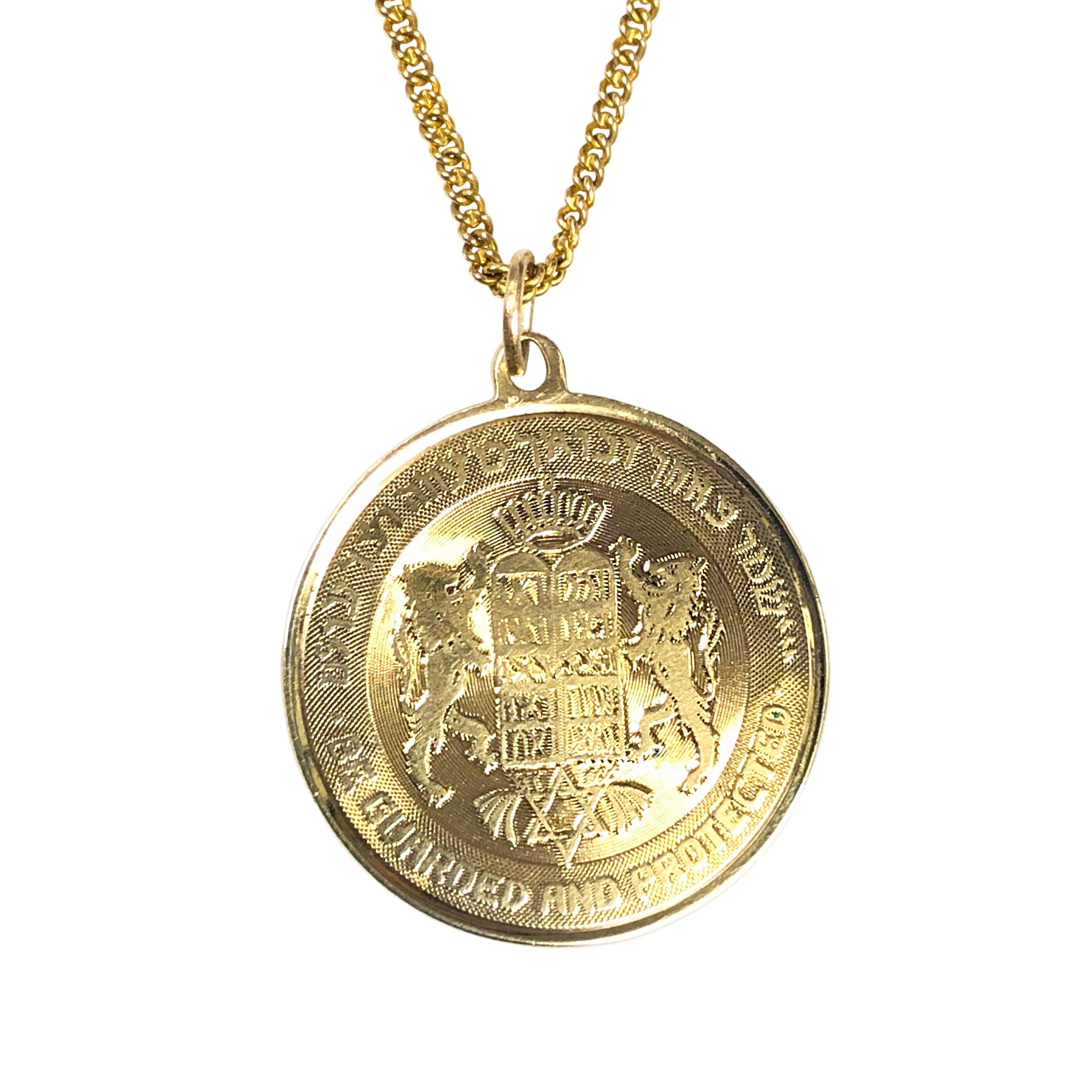 Circa 1970s 14K Yellow Gold ten Commandments disc pendant, necklace, owned and worn by Hollywood Icon Jerry Lewis and a gift from his friend also a Hollywood Icon Sammy Davis Jr. The pendant measures 1 inch in diameter and suspended from a 20 inch