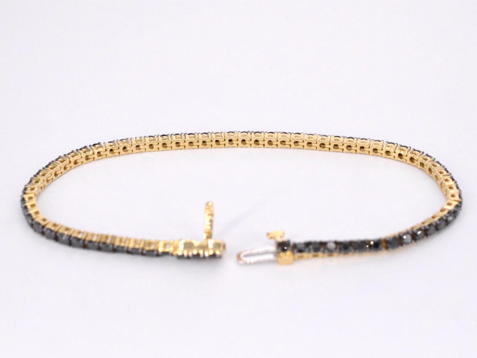 Women's Gold tennis bracelet set with black diamonds For Sale