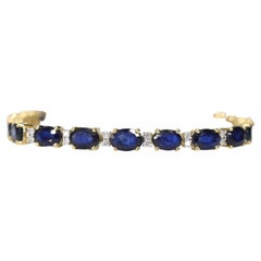 Gold Tennis Bracelet with Diamonds and Sapphire