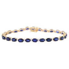 Gold Tennis Bracelet with Diamonds and Sapphire
