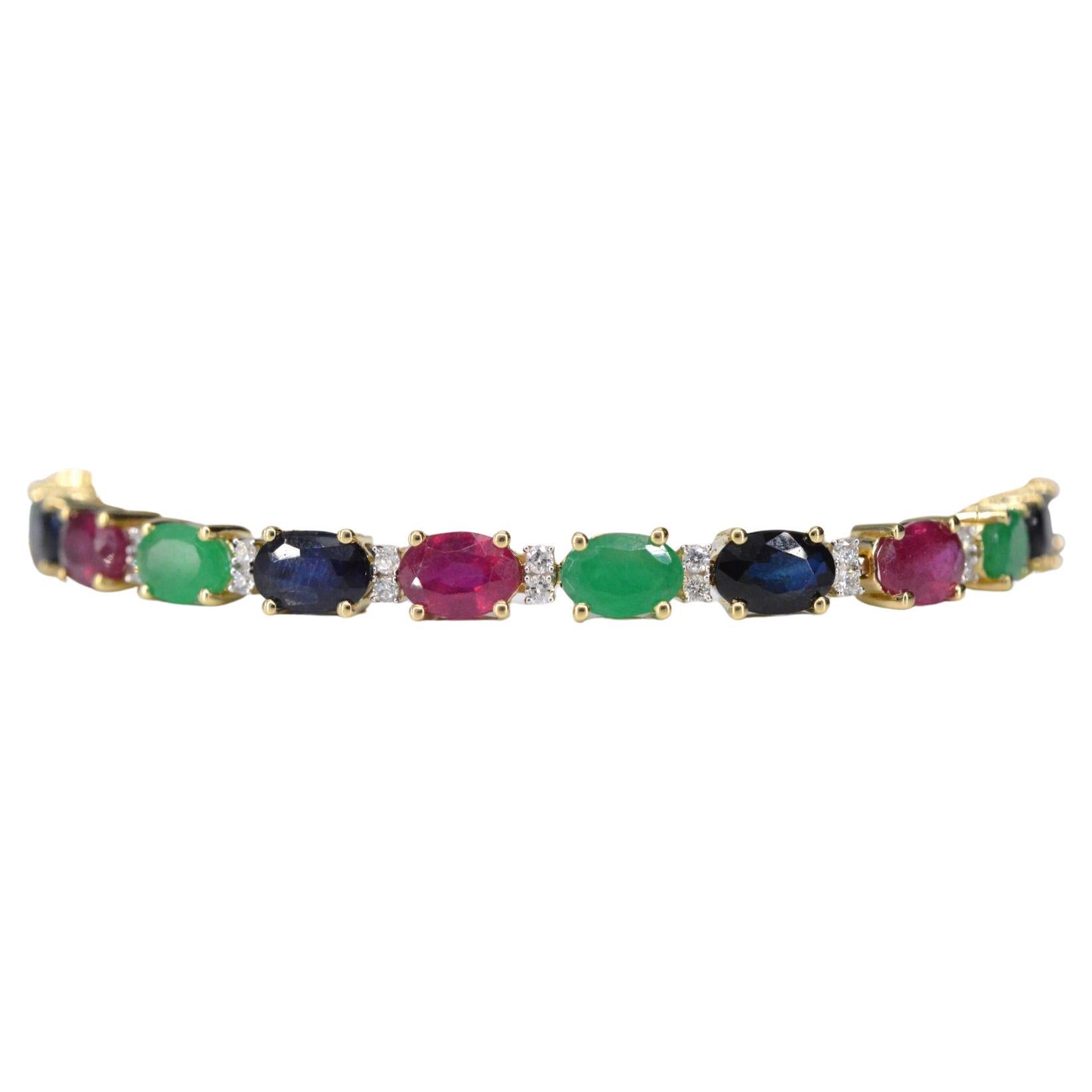Introducing an exquisite bracelet featuring a harmonious combination of diamonds and vibrant gemstones. The diamonds, with a total weight of 0.50 carat, are brilliant cut, providing a dazzling sparkle. They exhibit a color range of F-G and a clarity