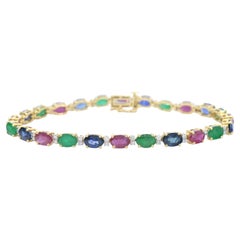 Bracelet tennis en or avec diamants, saphirs, rubis et émeraudes