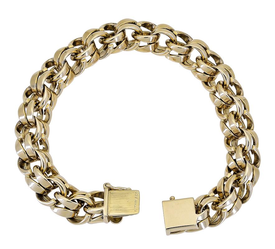 Extra heavy gold link bracelet.  Made and signed by TIFFANY & CO.  Very solid 14K yellow gold.  7 1/2