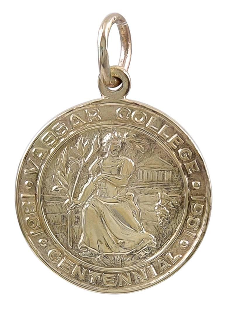 14K yellow gold Vassar College medal charm.  Made by TIFFANY.  Commemorating Vassar's centennial, 1861-1961.  3/4