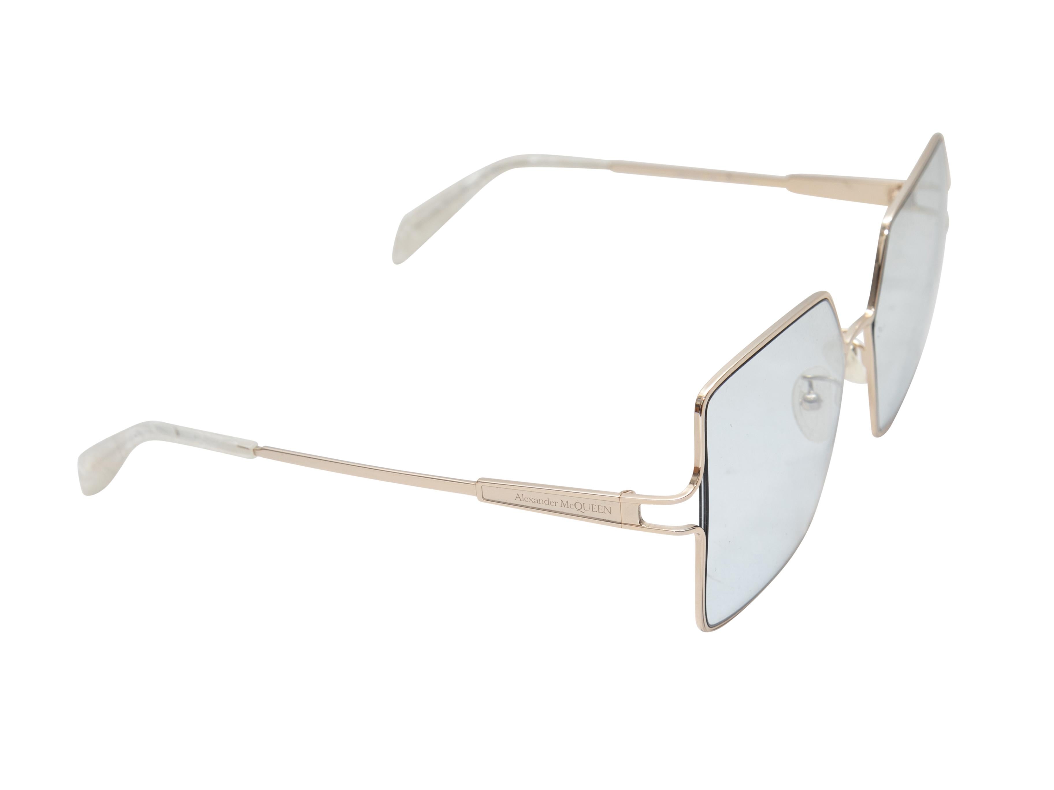 Gold-tone metal square sunglasses by Alexander McQueen. Blue tinted lenses. 2.25