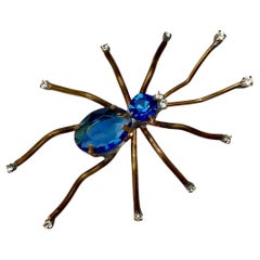Gold Tone Blue and Clear Rhinestone Spider Brooch