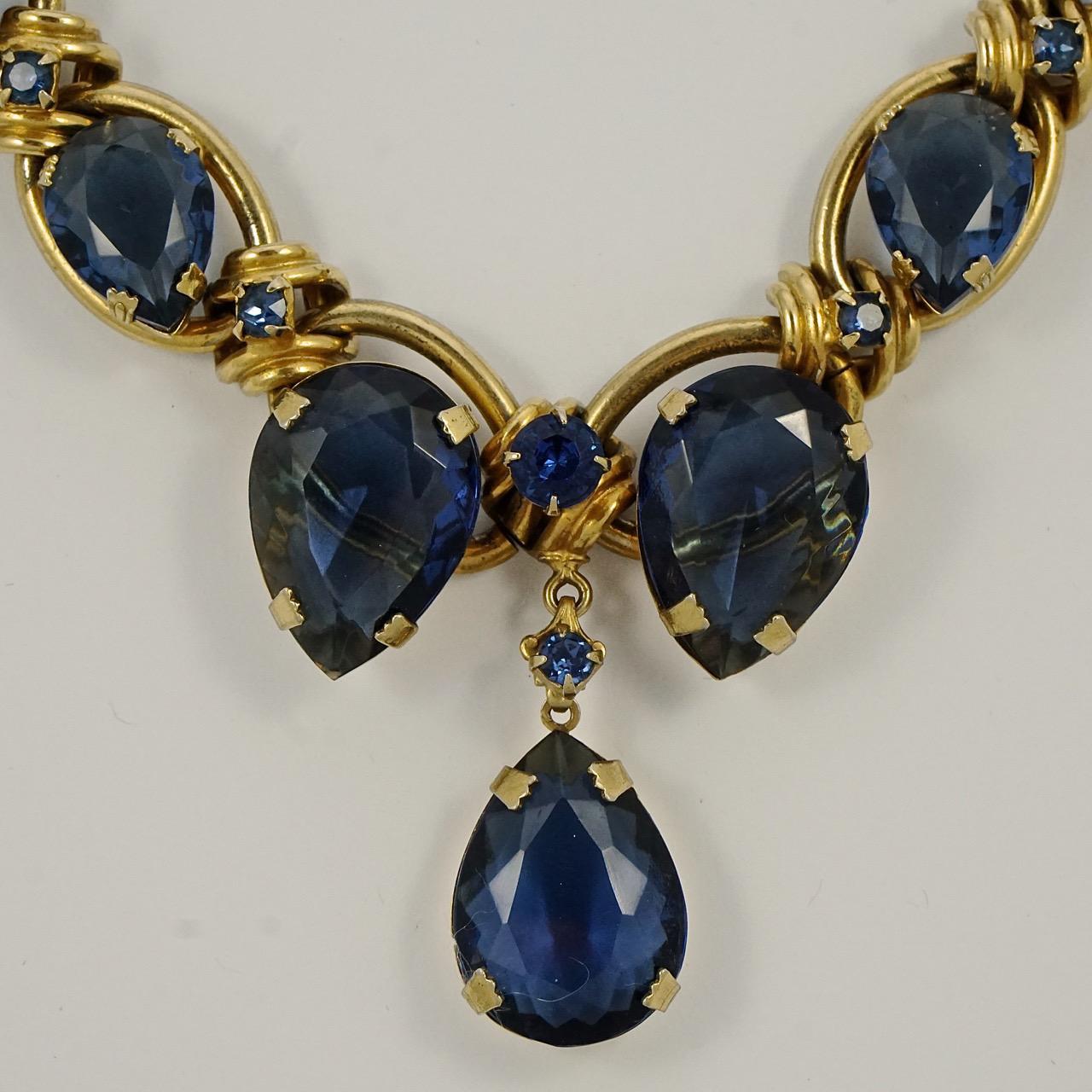 Fabulous gold tone and blue tear drop necklace, featuring seven tear drops. The large tear drops each measure length 2.5cm / .98 inch. The necklace is length 46cm / 18 inches, which is adjustable, and the width of the links is 1.75cm / .68 inch. The