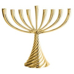 Menorah Giratoria Contemporánea de Metal Fundido Tono Dorado