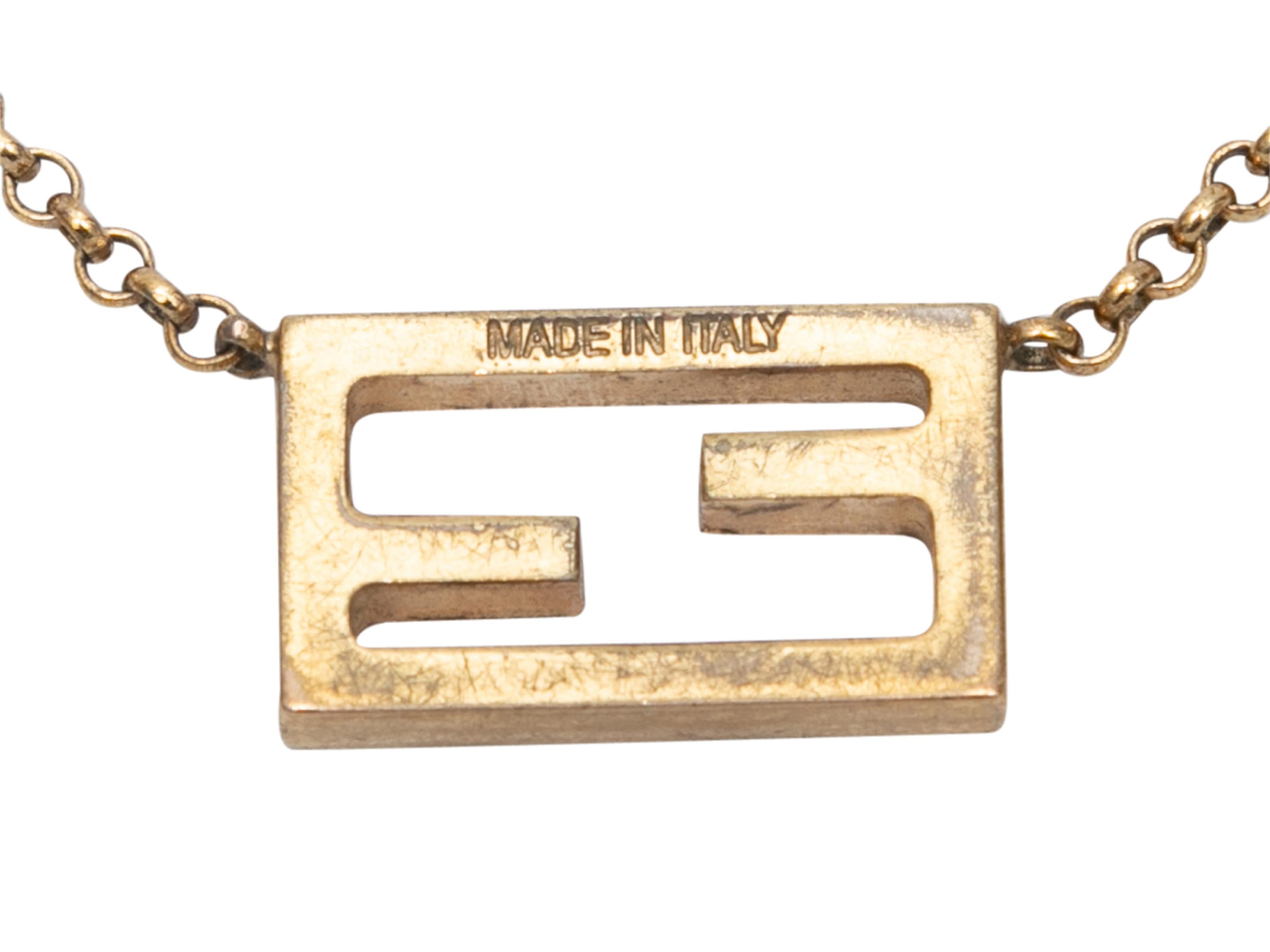 Gold-tone logo chain bracelet by Fendi. Clasp closure. 0.5