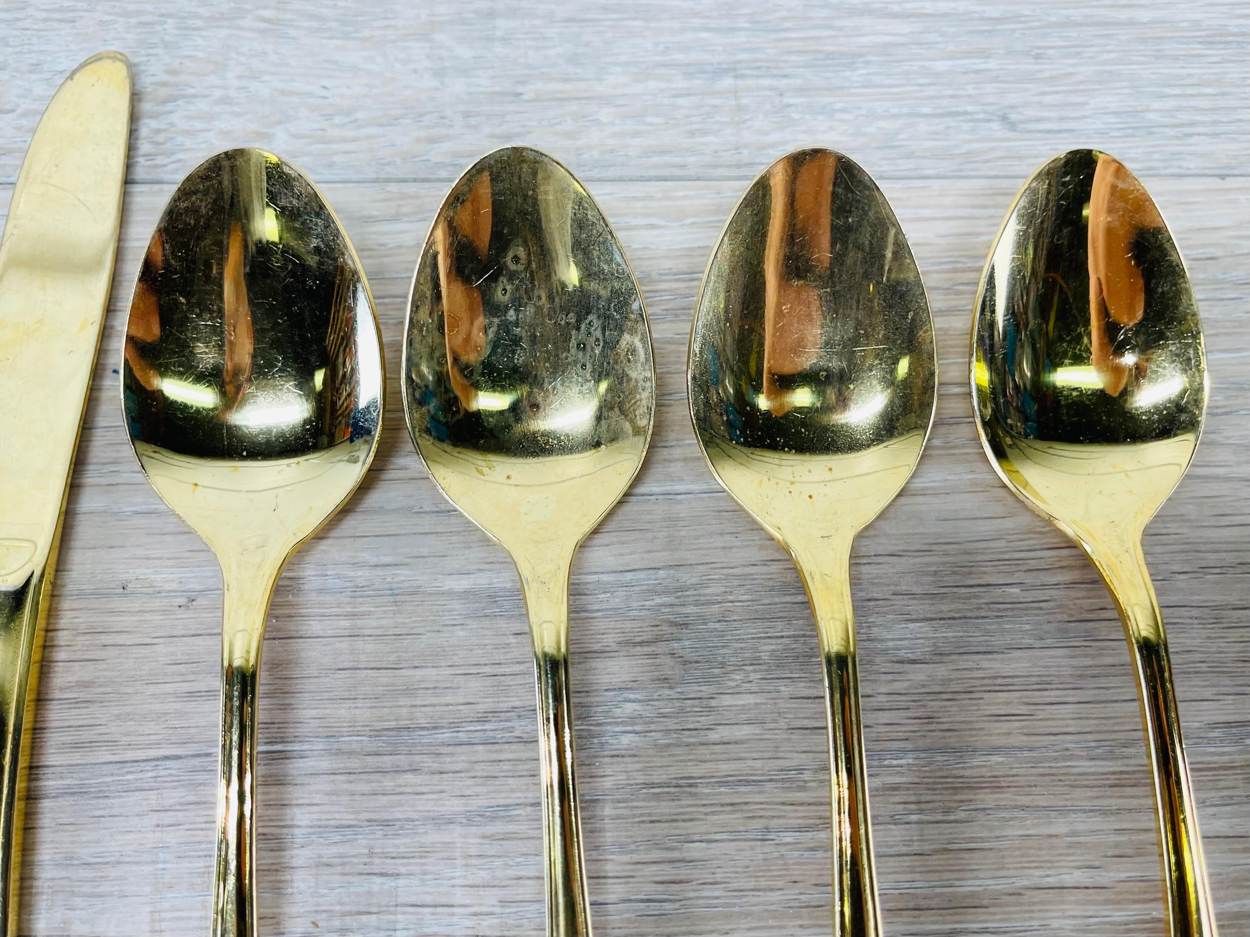 20th Century Gold Tone Flatware Set with Scroll Design, 24 Pieces For Sale