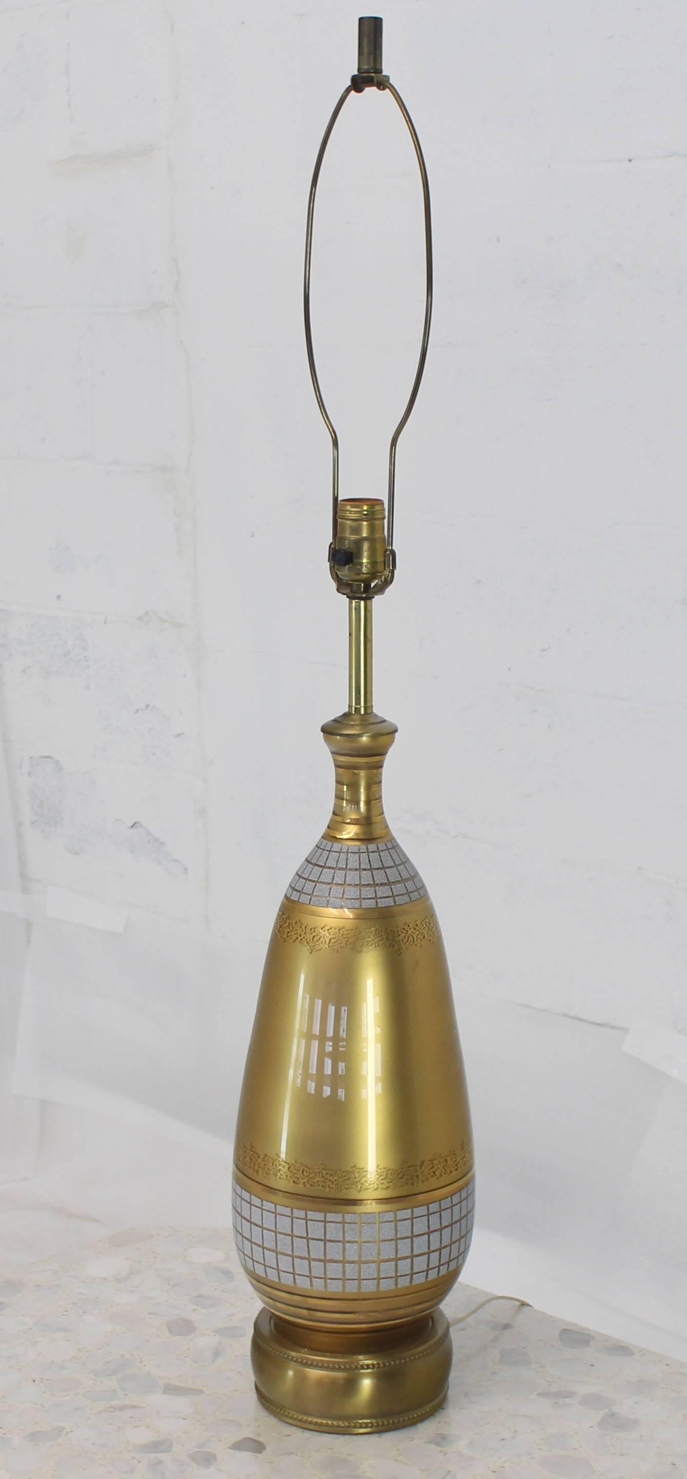 Mid-Century Modern gold tone glass vase shape table lamp.