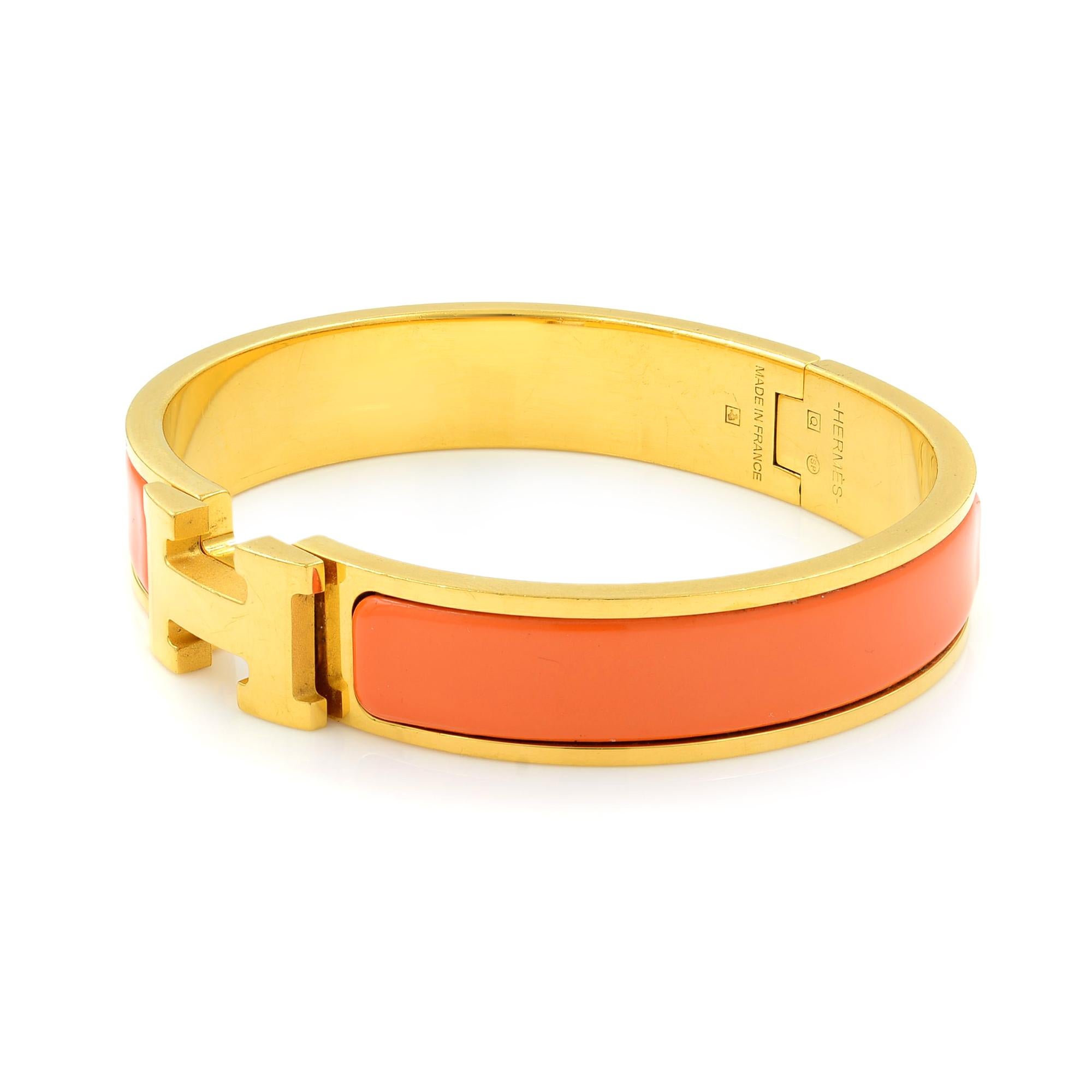 Modern Gold Tone Hermes Orange Clic Clac Bangle Bracelet