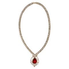 Gold Tone Pendant Necklace with Clear Rhinestones and a Red Rhinestone Teardrop