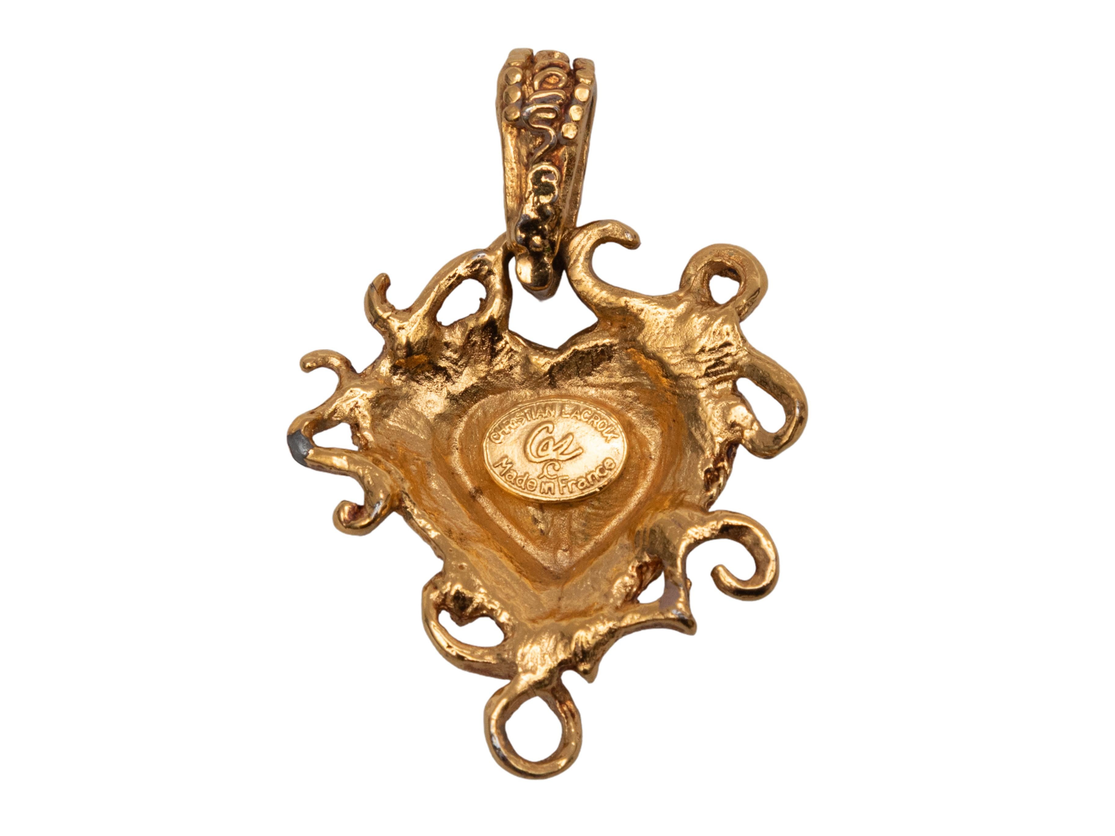 Ciondolo a cuore in metallo dorato e cristallo viola di Christian Lacroix. Larghezza 1,5