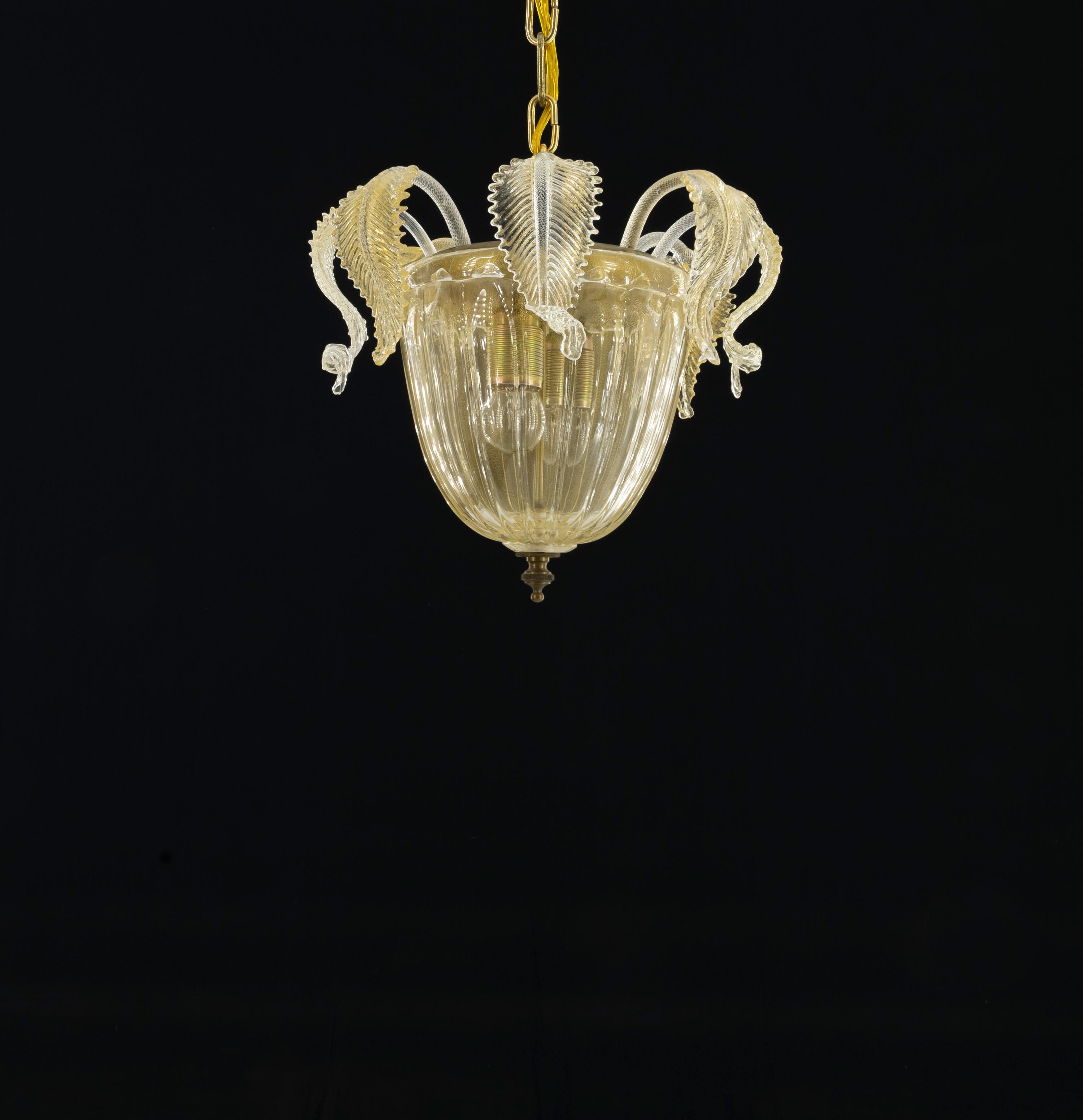 Gold tones Murano Glass Suspension and Flush Mount, modern and antique fusion.

This captivating lighting fixture is a testament to the versatility and timeless elegance of Murano glass craftsmanship.  Expertly handcrafted, it seamlessly transitions