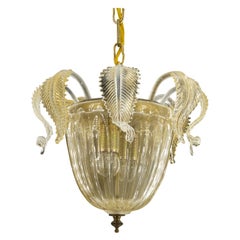 Suspension et affleurement en verre de Murano aux tons dorés, fusion moderne et antique.