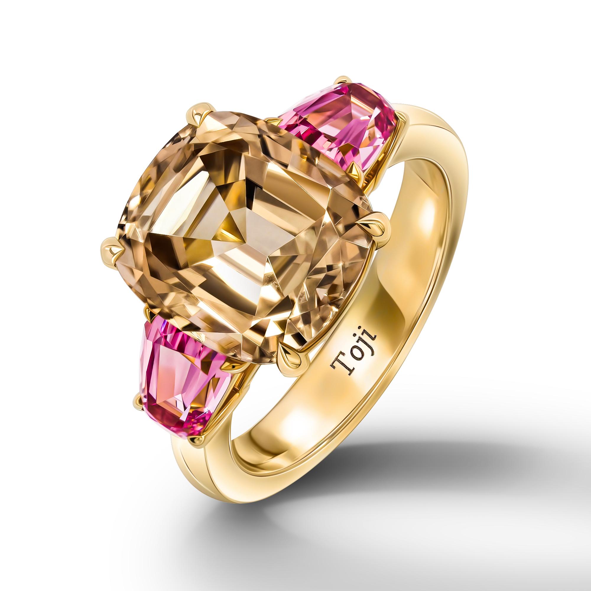 •	18k Yellow Gold
•	Gold color Tourmaline in cushion cut – total carat weight 5.47.
•	Pink Spinels in fantasy cut – 2 pc total carat weight 1.55.
•	Ring Size - 6