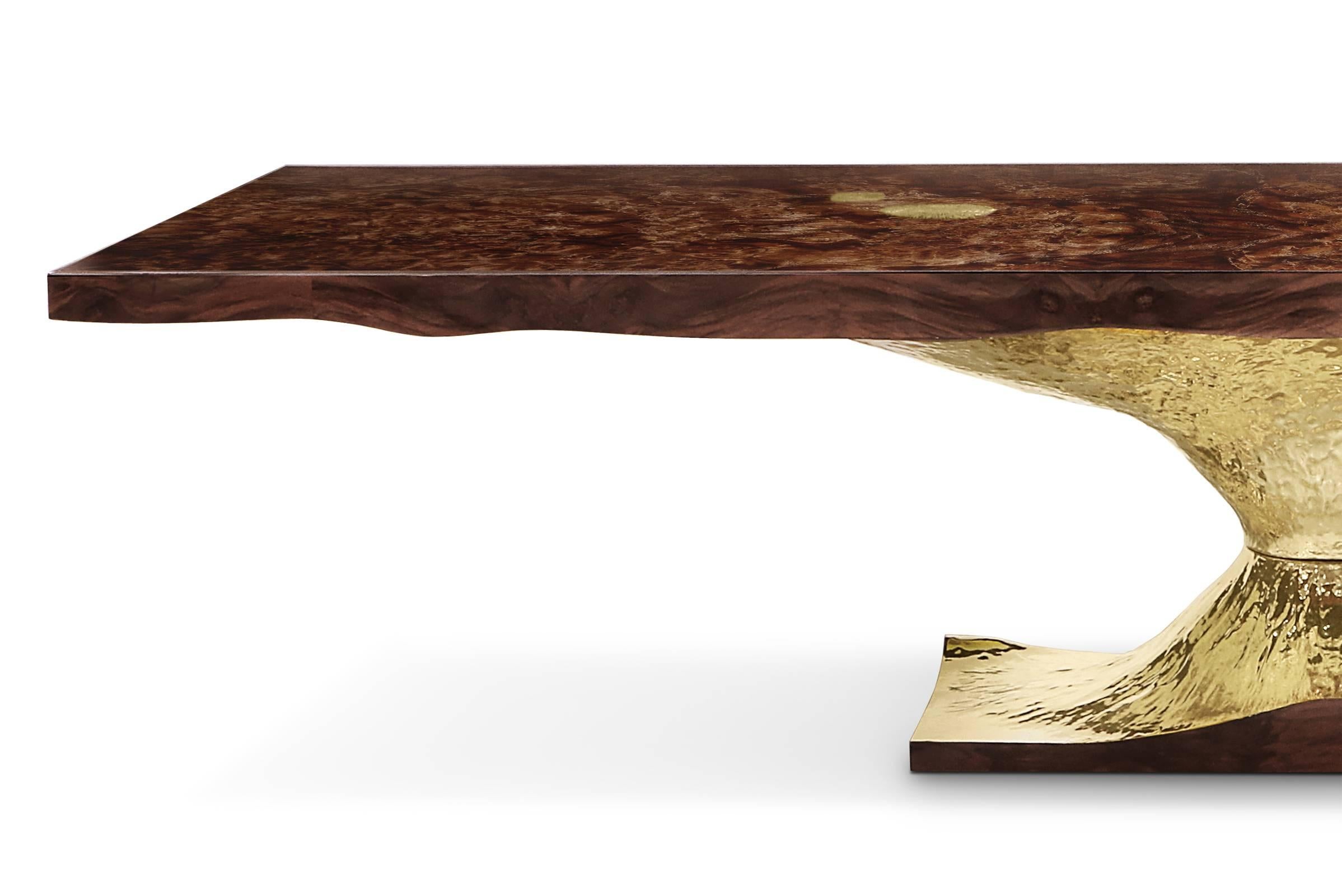 Dining or conference table gold tree with a walnut
root veneer top which include fossils textured details.
Base is in high polished brass. Exceptionnal piece, each
piece is unique.


 
