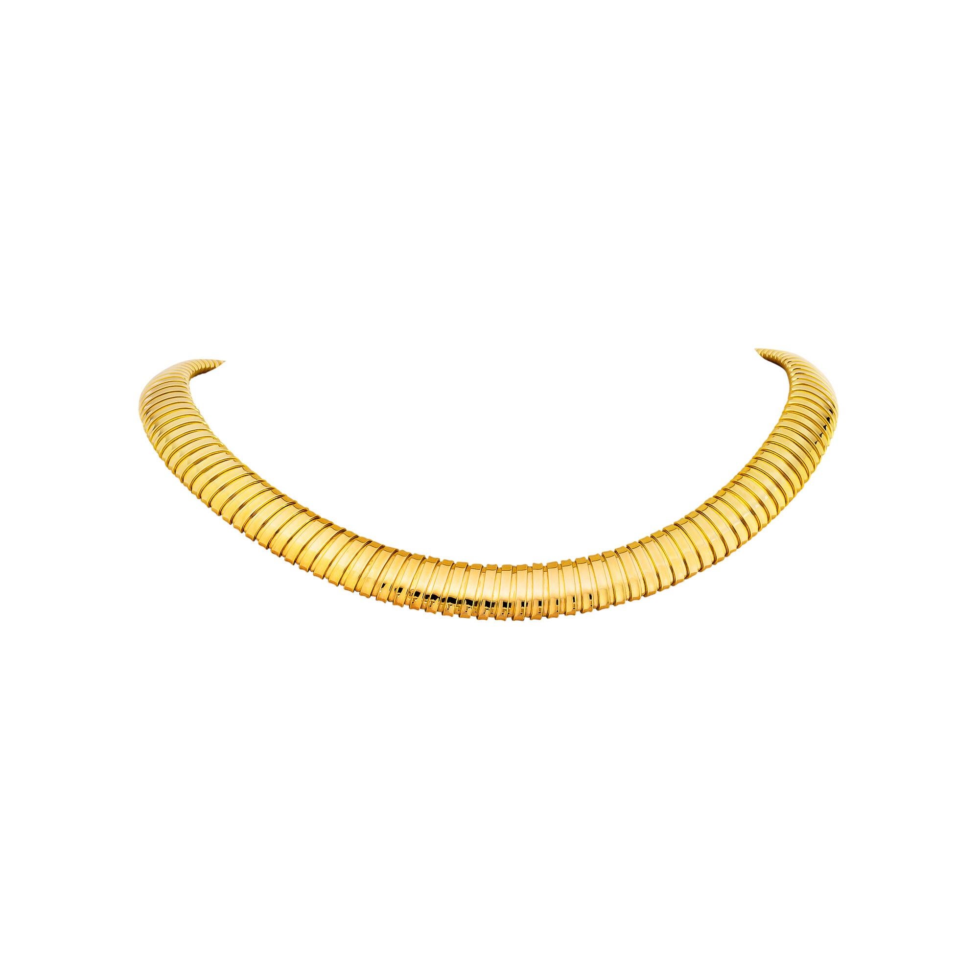 When only just the right amount of gold will do, this clean, sleek, and timeless handmade tubogas necklace will fit the bill. With a striking yet minimalist presence, this 18 karat yellow gold flexible necklace will quickly become your go-to