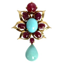Broche en or jaune 18 carats, turquoise et rubis cabochon