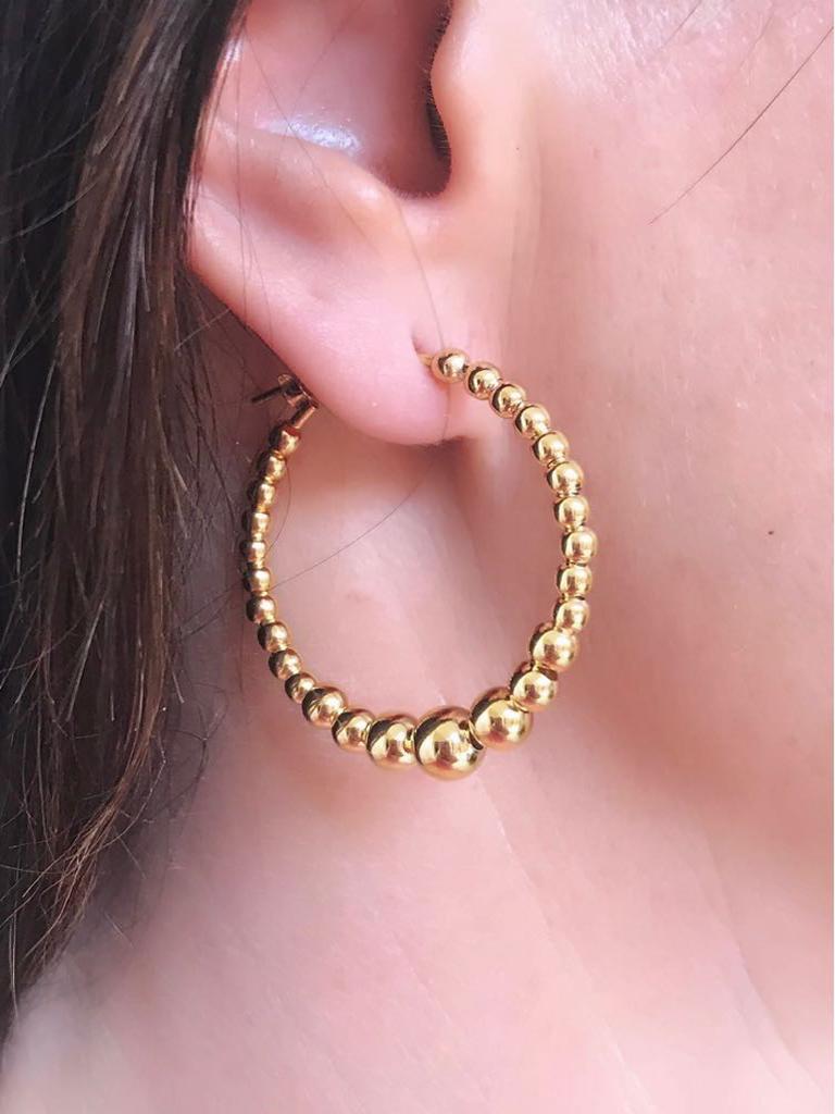 Make a statement this summer with these gorgeous Classic Twist Hoop earrings. Handcrafted in Italy from 18 Kt Gold on Sterling Silver, they are surprisingly light to wear. Height 3.4cm Width 3.4cm
