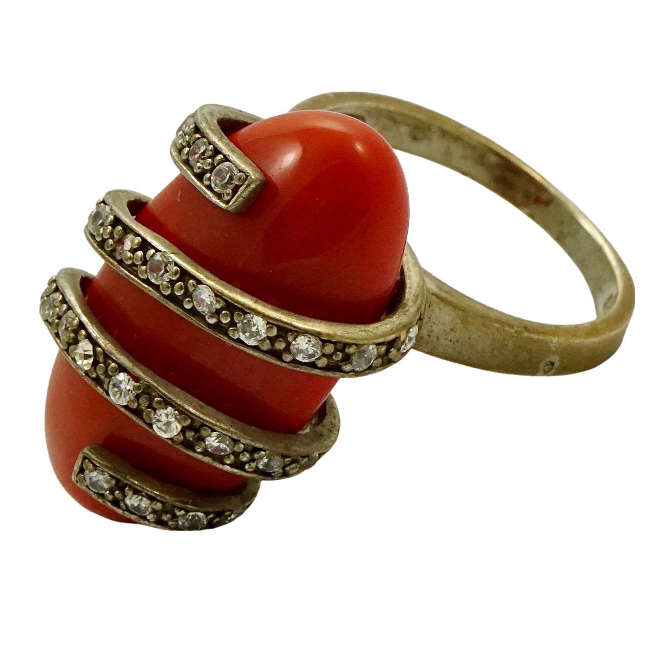
Lovely gold vermeil on sterling silver ring, featuring a coral glass stone with wrap around rhinestone detail. Ring size UK M / US 6, inside diameter 1.75 cm / .68 inch, and measuring length 2.5 cm / .98 inch. There is scratching and wear as