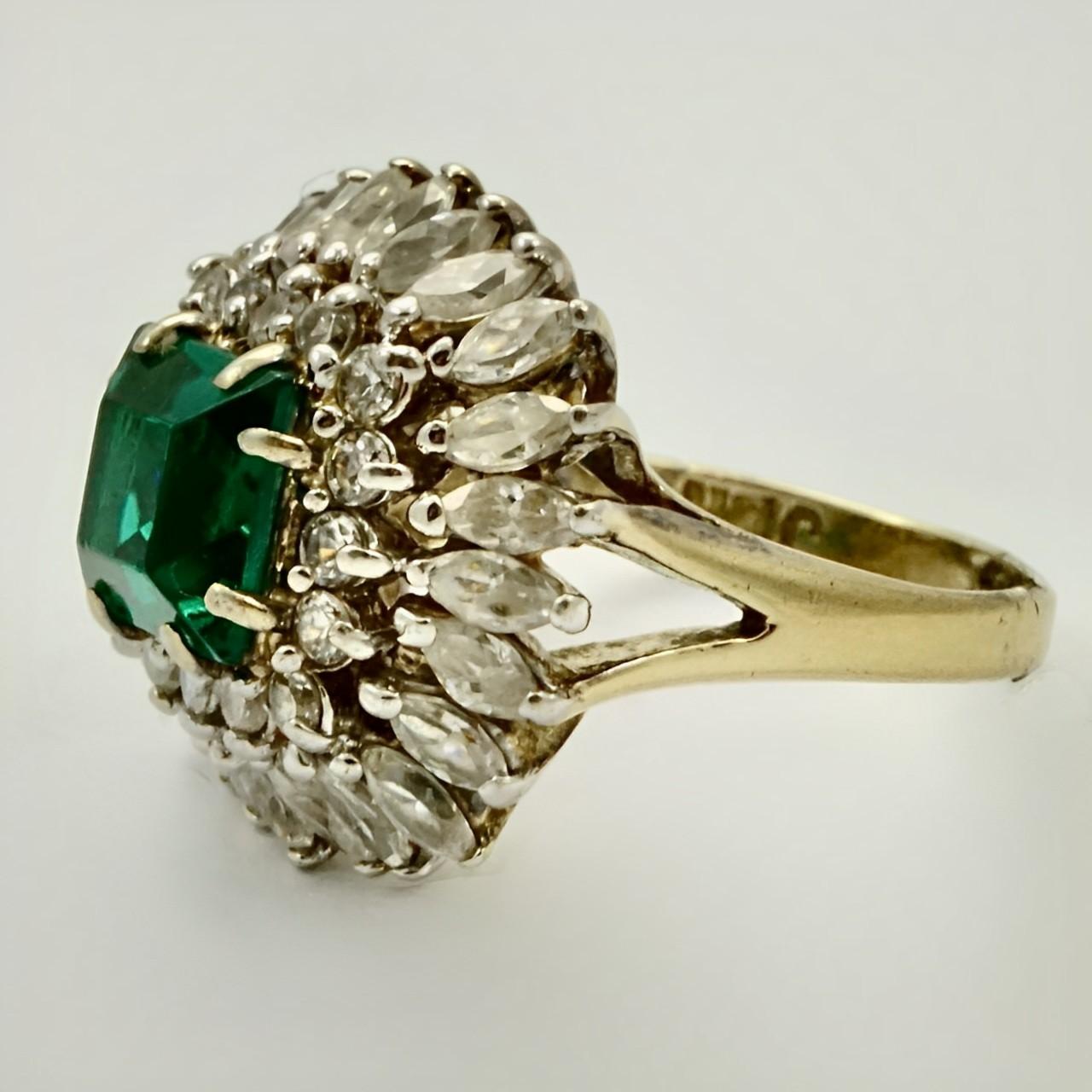 
Stunning gold vermeil on sterling silver cocktail ring, set with beautiful marquise and round rhinestones, and a lovely centre emerald green square rhinestone. Ring size UK K 1/2,  US 5 3/8, inside diameter 1.7 cm / .67 inch. Measuring 1.9 cm / .74