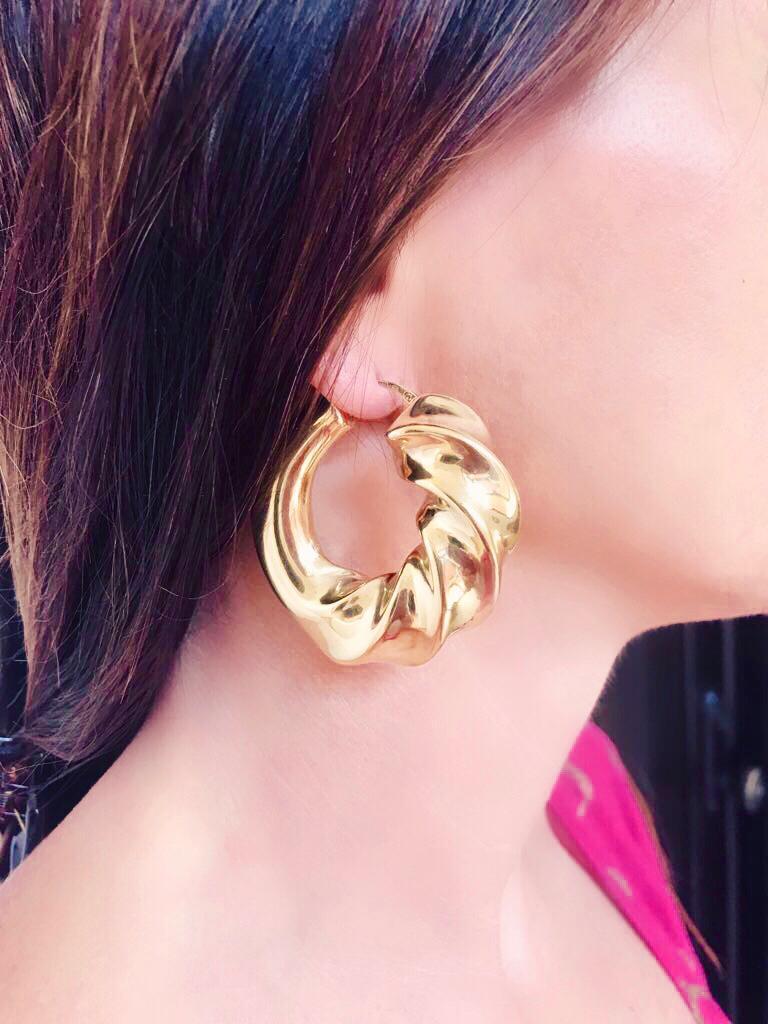 Make a statement with these gorgeous Hoop earrings. Handcrafted in Italy, made with 18 Kt Gold on Sterling Silver, they are surprisingly light to wear! Height: 5 cm, Width: 5 cm

