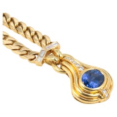 Gold Vintage Bulgari Necklace Set with a 4.59 Carat Sapphire and Diamonds