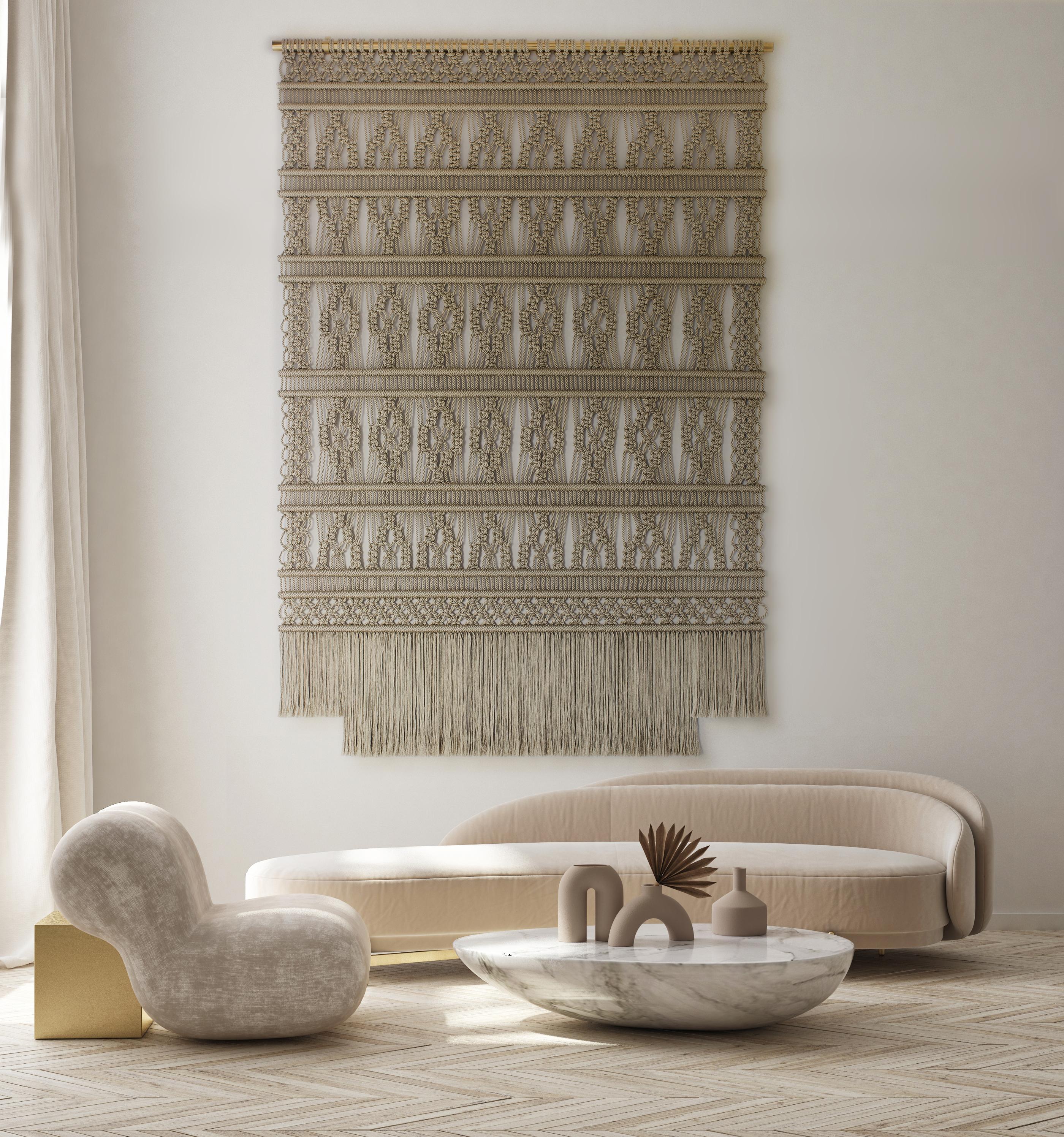 Gold Rope Wall tapestry hand knotted
Size on photo 180cm x 265cm
The size can be adjusted to your wishes
The Macrame wallhanging is handmade by Milla Novo
Lead time 4 months.

Milla Novo is an artist based in the Netherlands. She creates