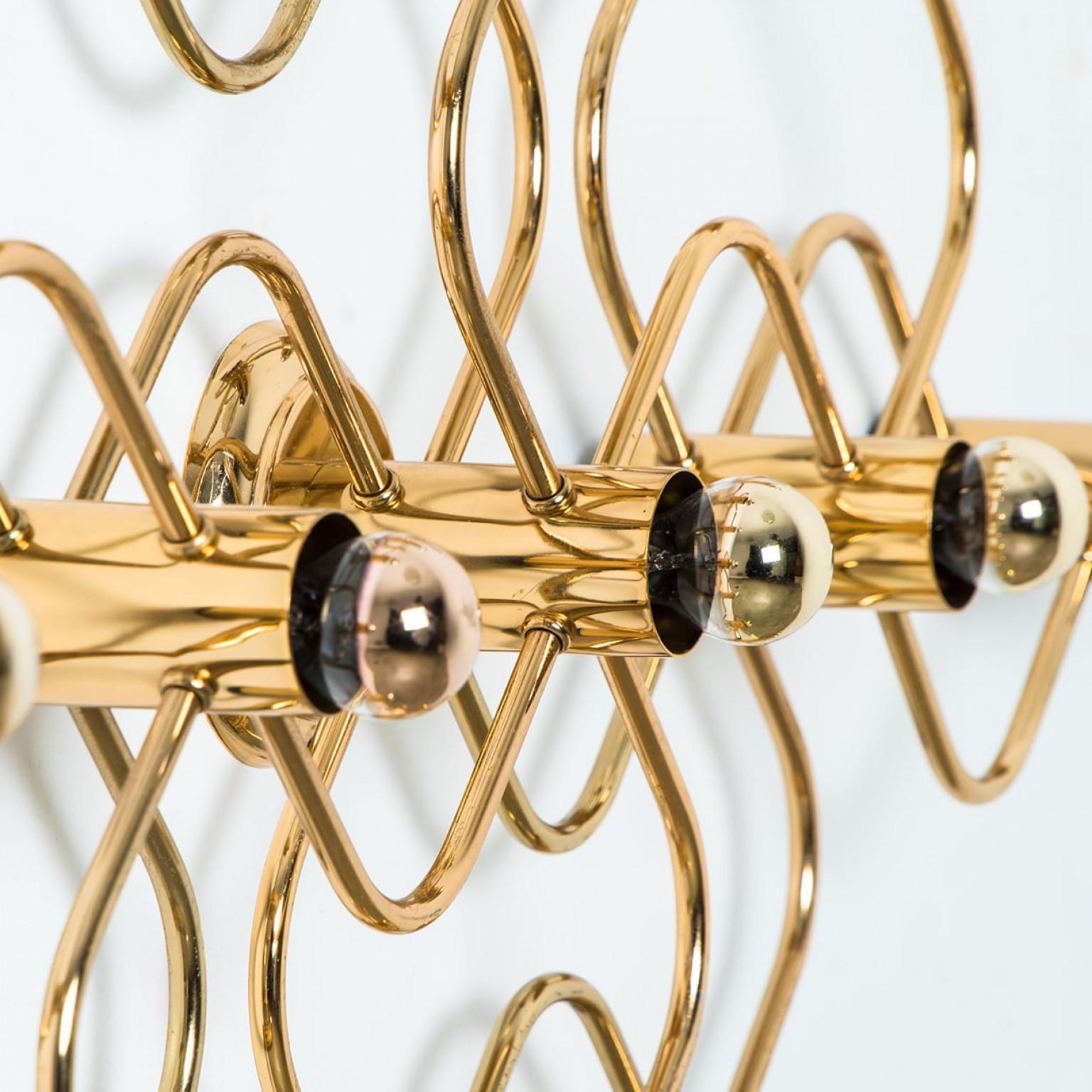 A gorgeous Sciolari-style ceiling or wall light. Made of a weave of golden rods, Germany, 1970s.

Dimensions:
Height: 25.98