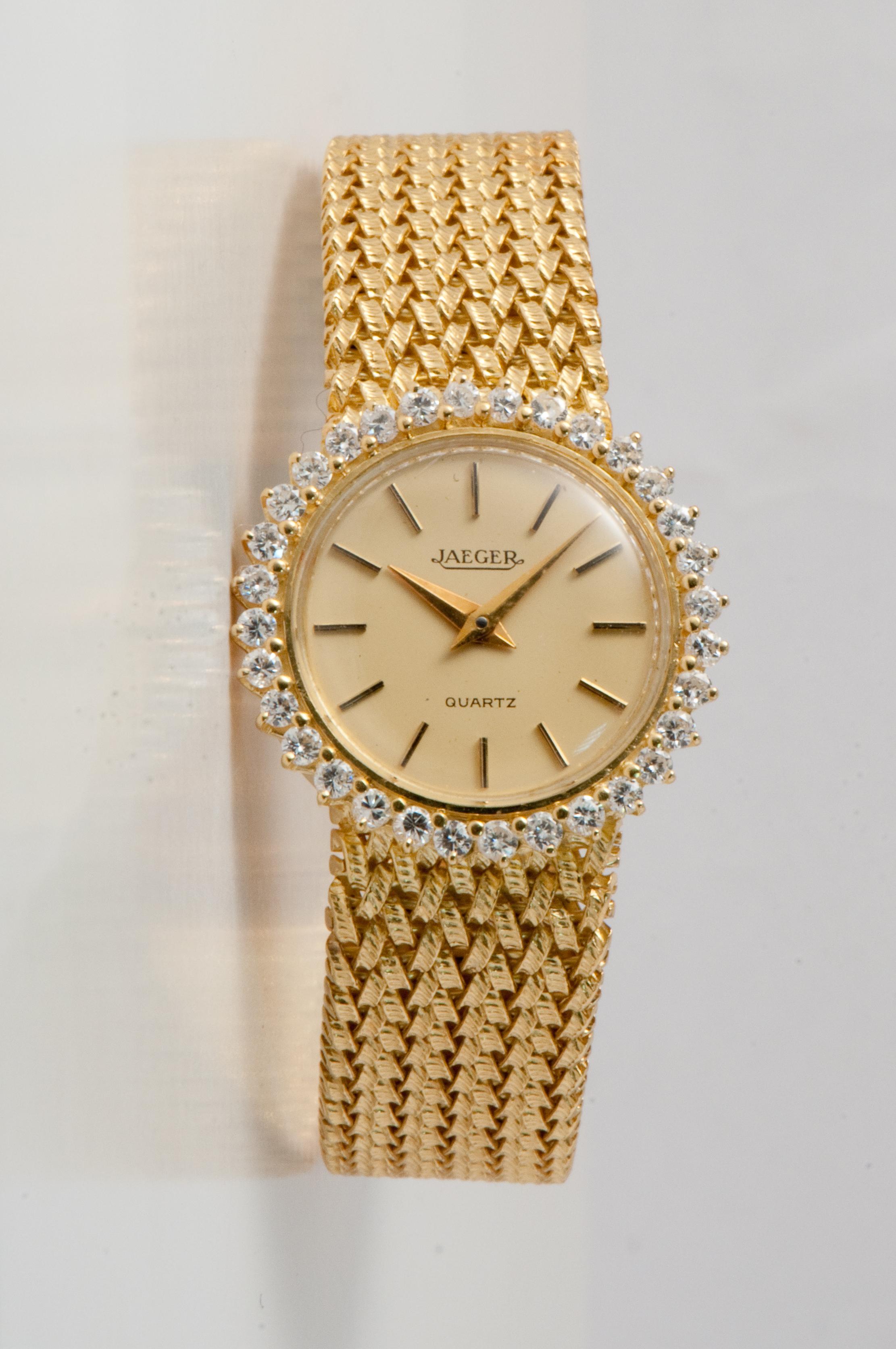 Gold Watch with 32 diamonds (0.03 ct) total 0.96 ct
Gold 42.93 g
Diameter 25 mm