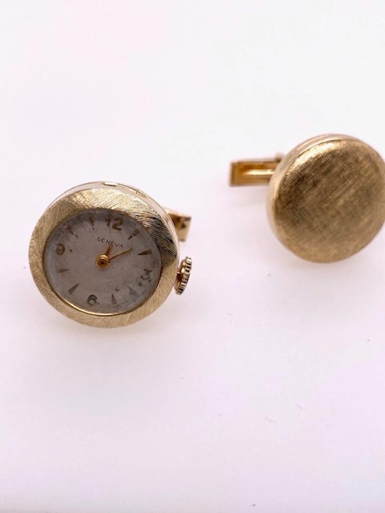Retro cufflinks.  14K textured yellow gold.  One side is a mechanical watch, made by Geneva.  In working condition. T-back closure.  3/4