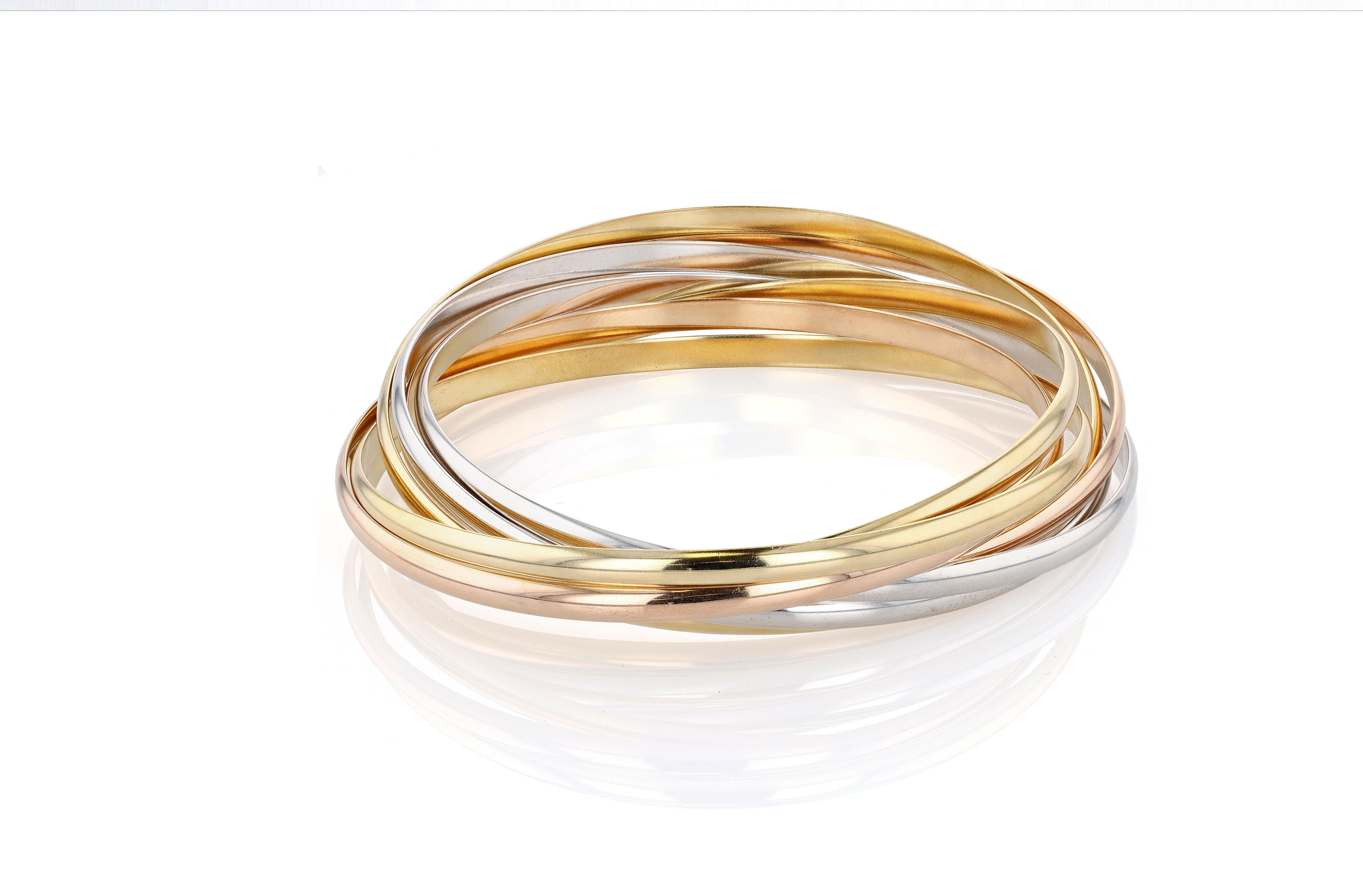 Bracciale a sette file Cartier Trinity in oro, oro bianco e oro rosa In condizioni buone in vendita a Princeton, NJ