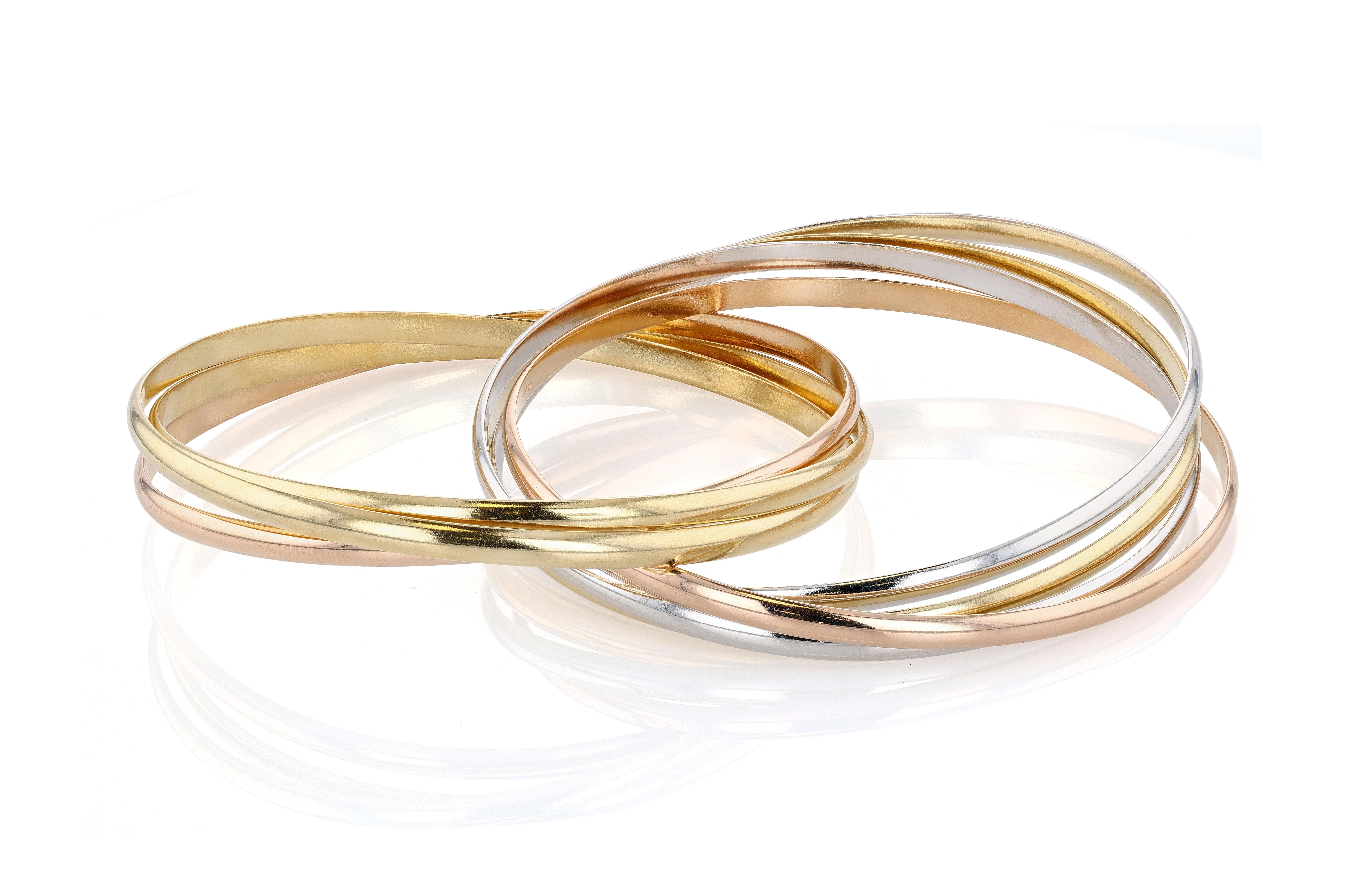 da uomo o donna Bracciale a sette file Cartier Trinity in oro, oro bianco e oro rosa in vendita