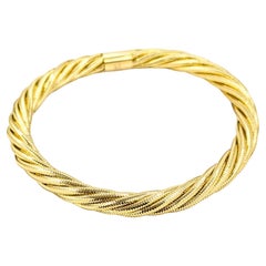 Bracelet jonc flexible tissé en or jaune 14 carats