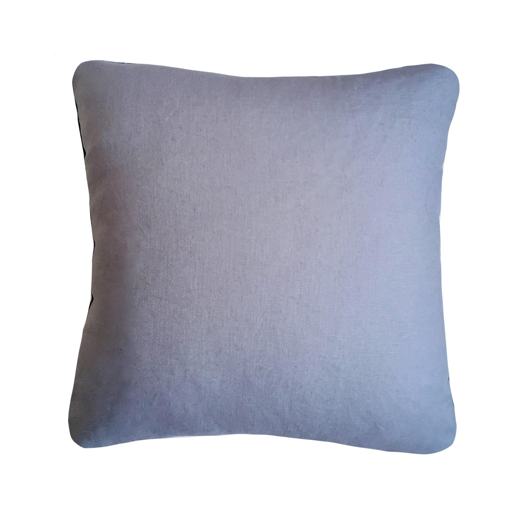 Gold velvet cushion dyed with indigo in Ikat pattern with grey linen backing. Hand-dyed and sewn in New York City, down pillow insert made locally in NYC. Pillow measures 18 x 18 inches. Each velvet cushion is hand made and one of a kind.

Custom