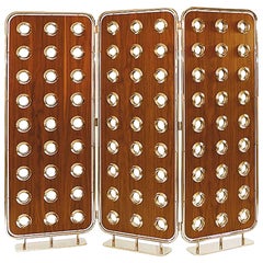 Paravento ad anelli dorati con venerazione in noce massiccio