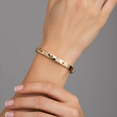 Golden 14K (or 18k upon request) Yellow Gold Baguette Diamond Floral Bracelet