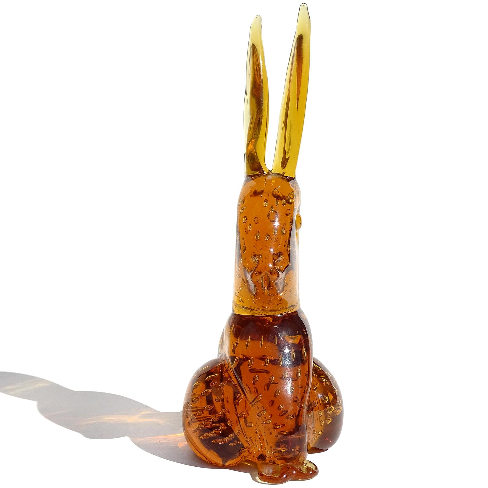 Cute vintage handblown golden amber with controlled bubbles, Italian art glass bunny rabbit sculpture / figure. It does not have a label, but I have owned previous ones with a 