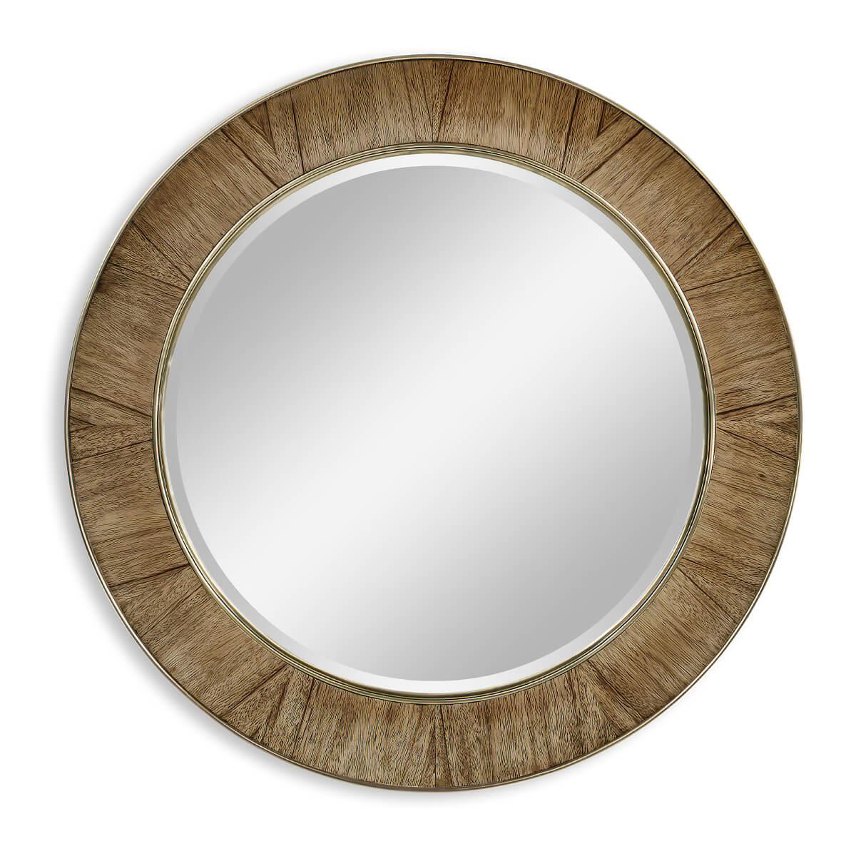 Ce miroir rond de 48 pouces de forme concave en placage d'ambre doré a une garniture en laiton et une plaque de miroir biseautée.

Dimensions : 48