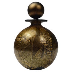 Frasco de perfume de vidrio iridiscente dorado y negro de Isle of Wight Studio Glass